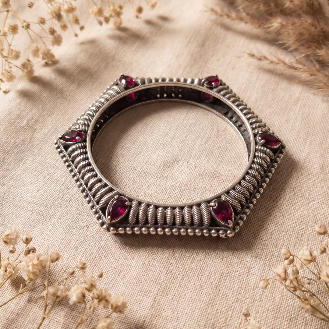 Six Sides of Stunning — Hexagonal Ruby Bangle in Oxidised Silver