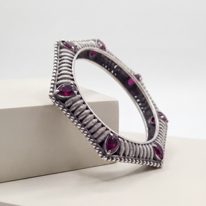 Six Sides of Stunning — Hexagonal Ruby Bangle in Oxidised Silver
